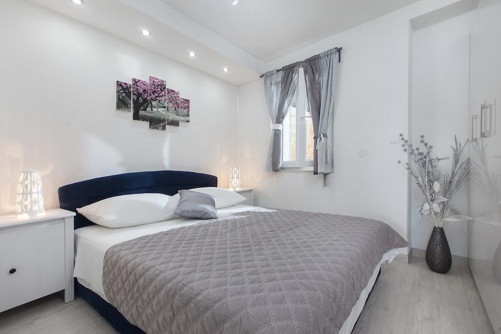 Apartments Orka Promajna Pokoj fotografie